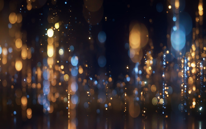 Sparkling shiny blue and golden yellow glittering lights vector illustration on black background