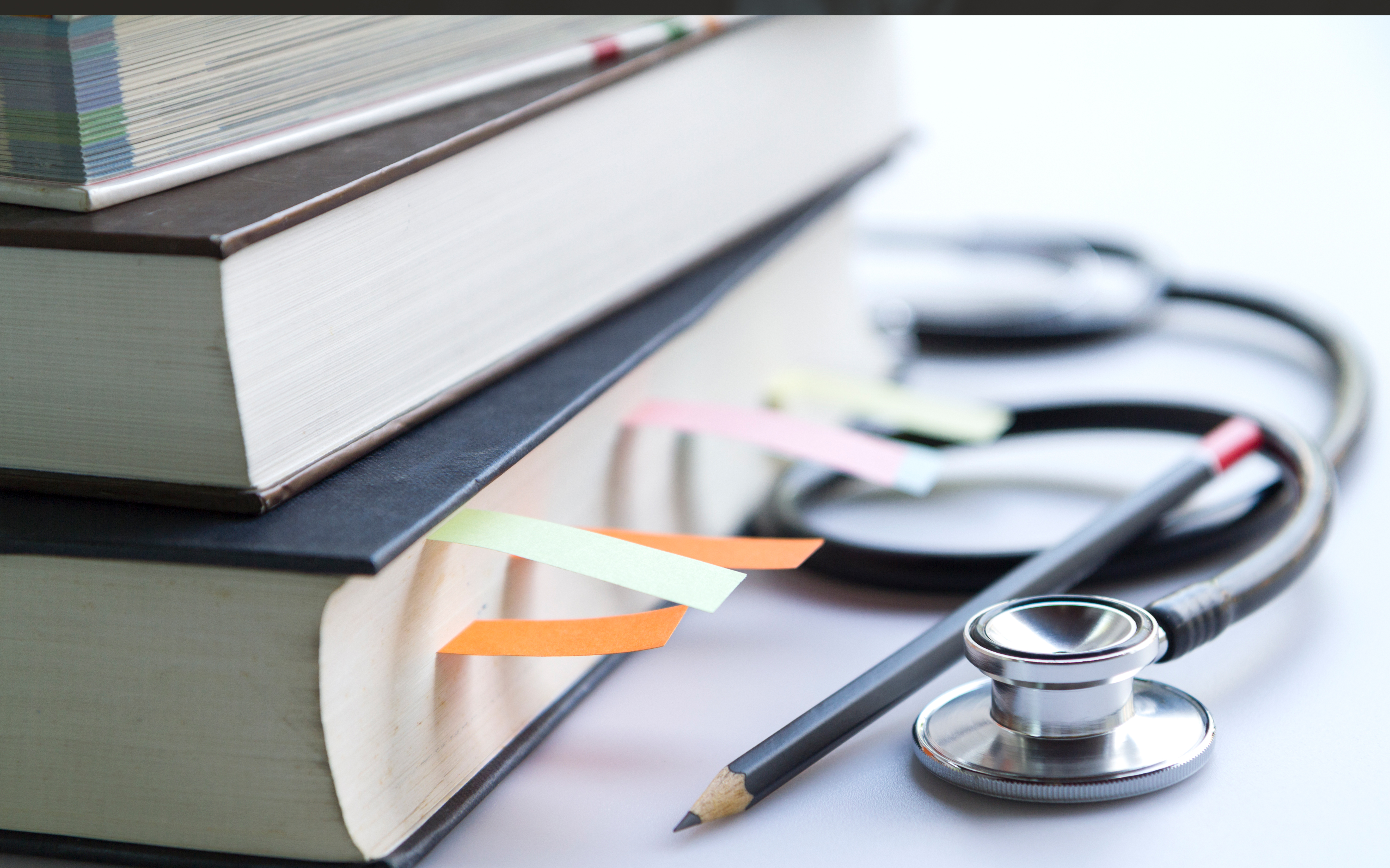 image of books and stethoscope