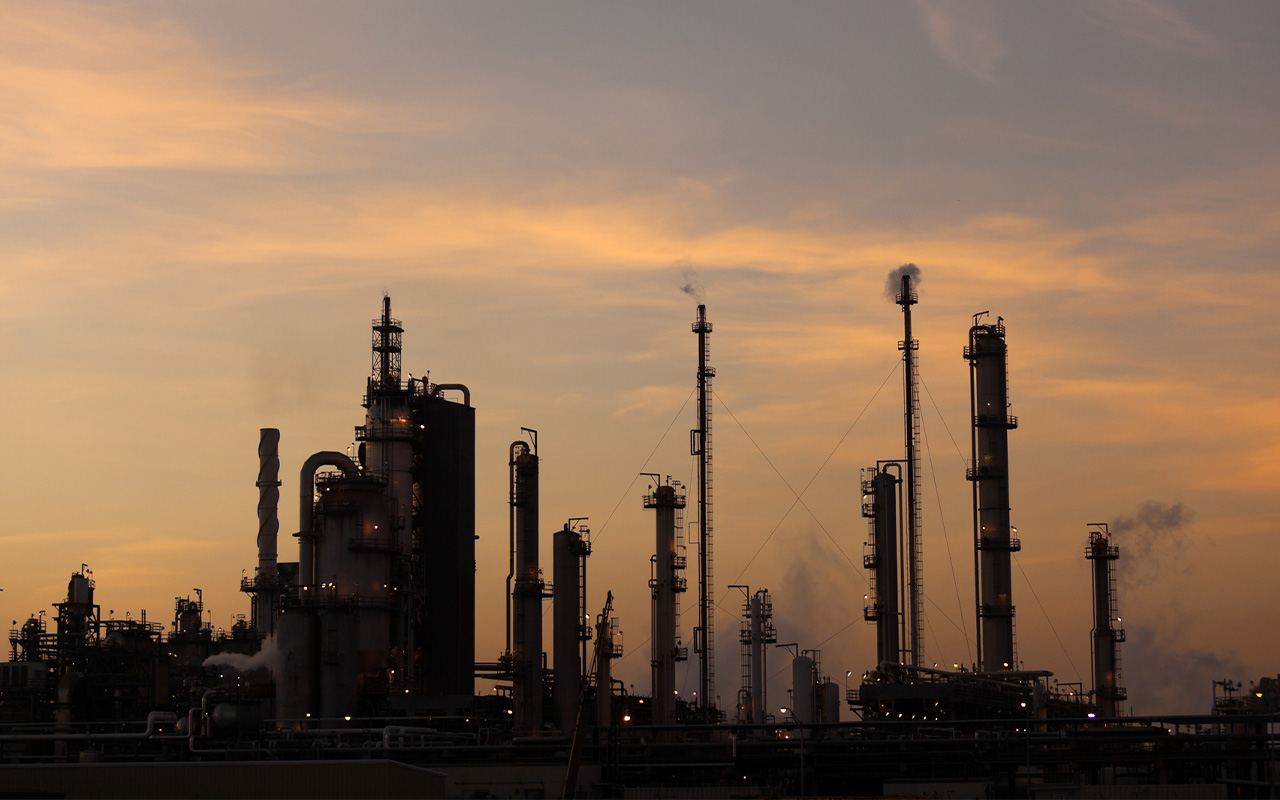 oil refinery at dusk
