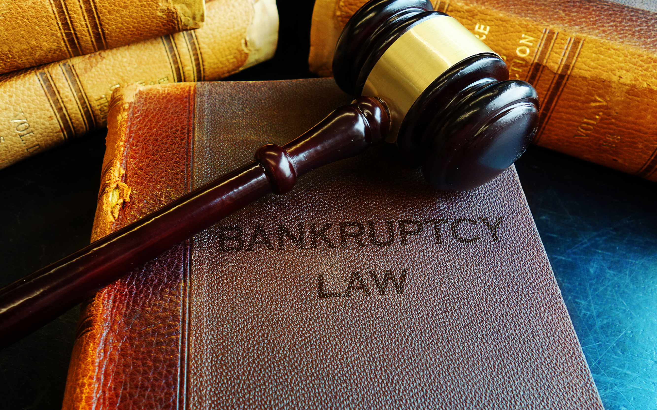 Gavel on bankruptcy law book