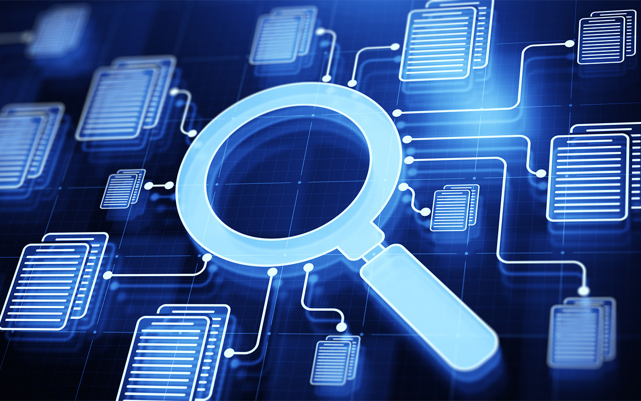 Magnifying glass surrounded by icons of papers