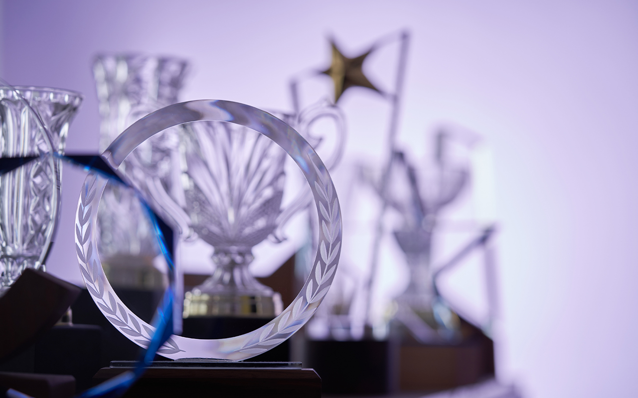 Glass awards on table