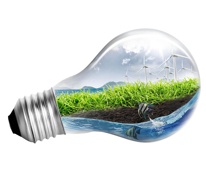 light bulb with clean environment inside showing clean water, grass, and wind turbines