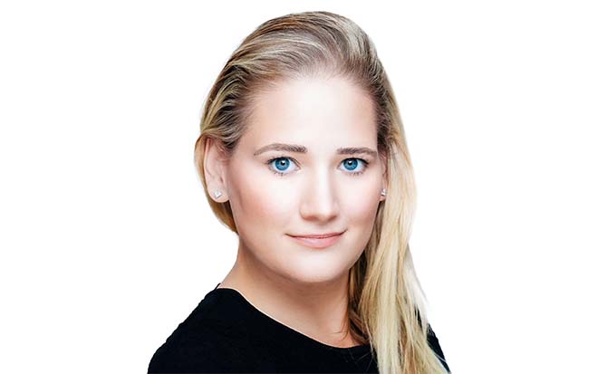 Headshot of Liz Demaree against a white background