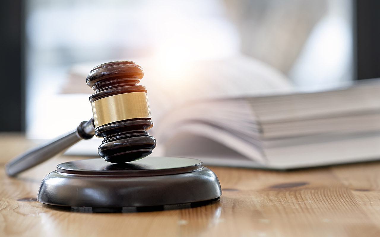 Wooden brown judge gavel on the table, copy space, banner background. - stock photo Wooden brown judge gavel on the table, copy space, banner background