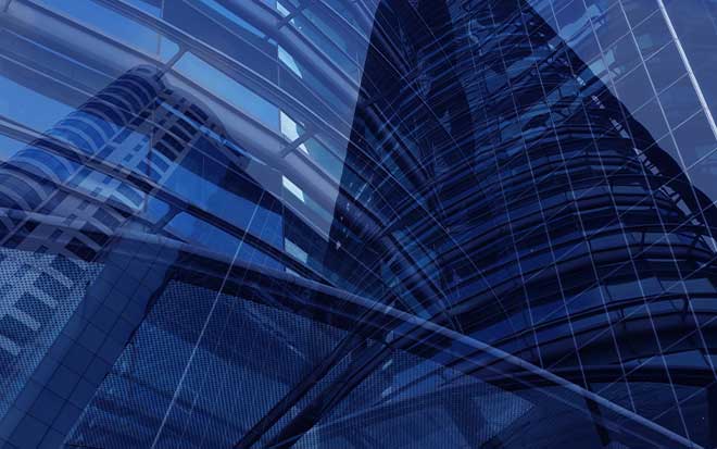 Skyscraper reflecting in blue lighting