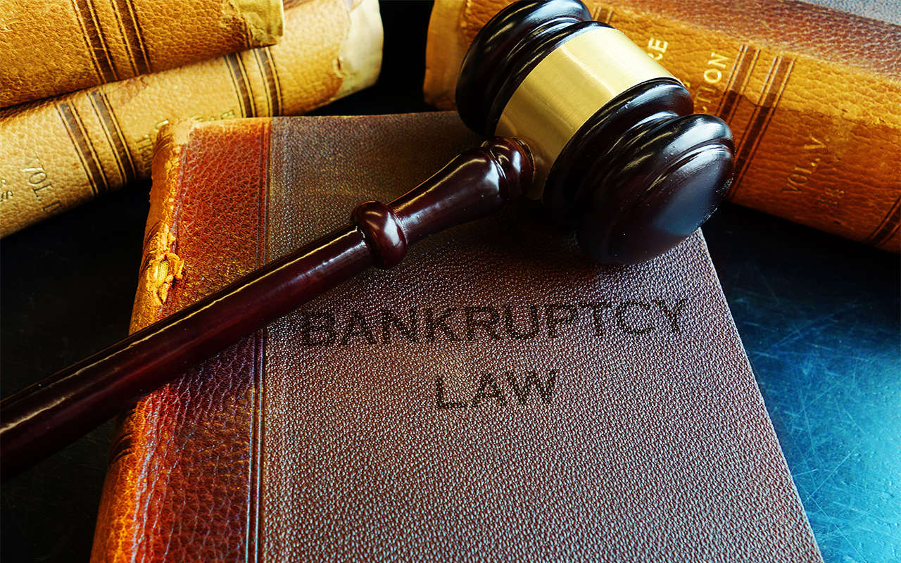 Bankruptcy Law books with court gavel