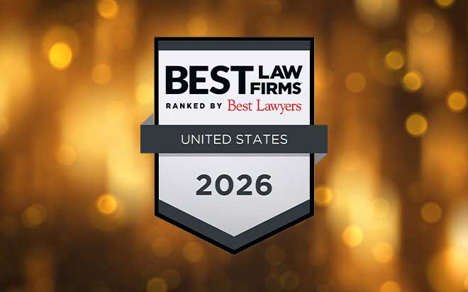 Badge with gold sparkle backdrop, reads: "2026 Best Law Firms ranked by Best Lawyers"