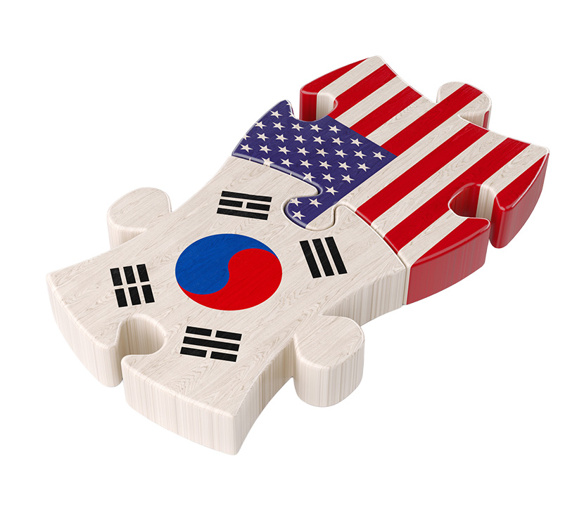3d render of two jigsaw puzzles textured with USA and South Korea Flags