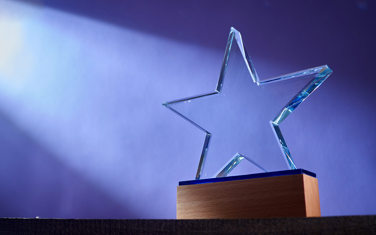 Star with a light shinning on it
