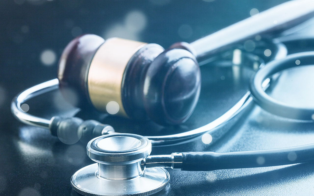 Image of a gavel and stethoscope
