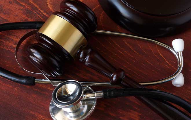 Image of a gavel and stethoscope