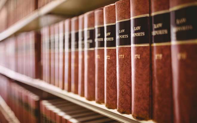 Close up of a lot of law reports in library