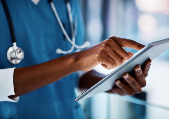 closeup shot of doctor touching a smart tablet screen