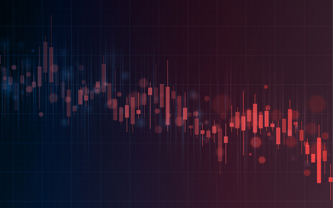 Red financial market chart candles on a black abstract background for representing falling stock prices