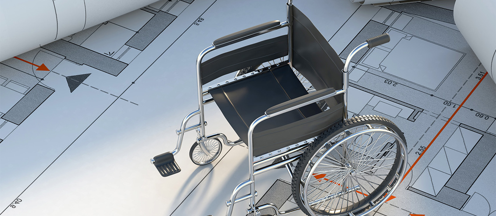 Image of a wheelchair over blue prints