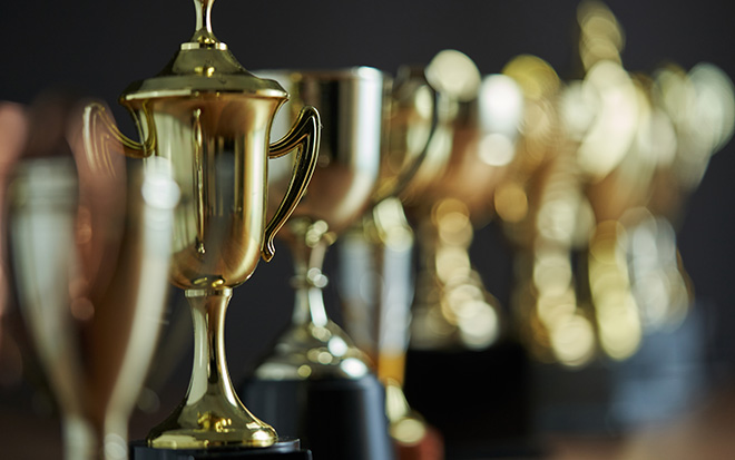 Group of trophies in a row