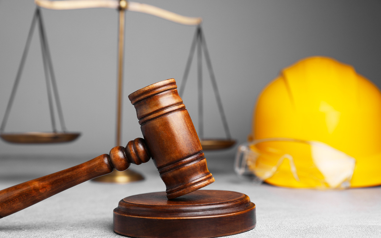 construction and gavel and the scales of justice