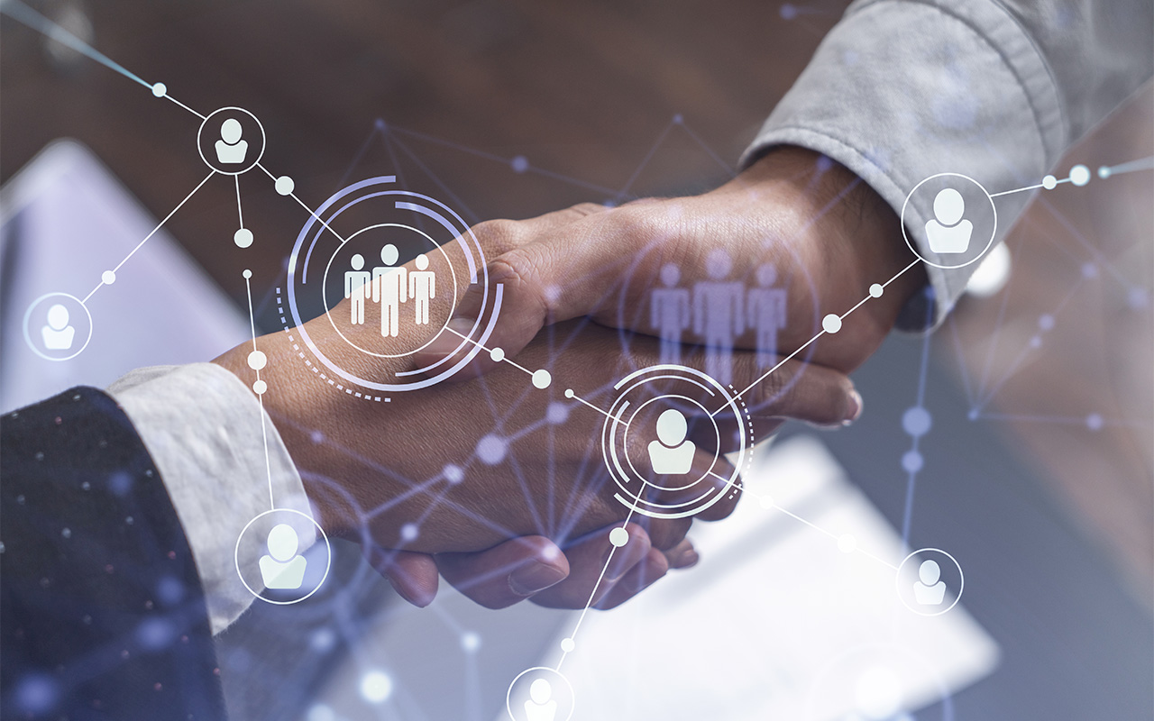Handshake with social media graphics layered on top.