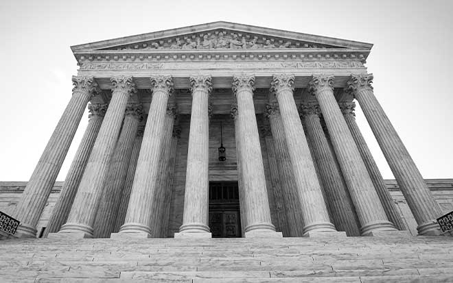 Black and white photo of the Supreme Court of the United States building