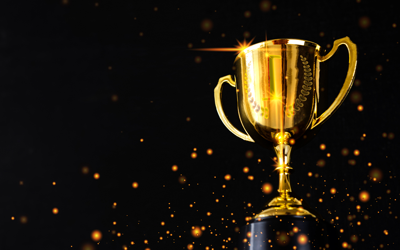 Gold trophy with black background