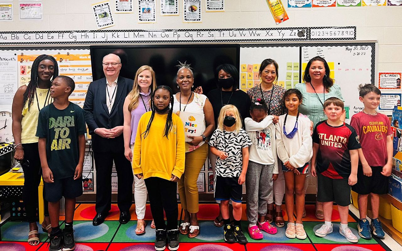 Nelson Mullins' early literacy interventionists attended an end-of-year party where they got to meet their students in person, eat snacks, and play games. From left, Michelle German, Charles Huddleston, Amanda Holcomb, Hana Njau-Okolo, Tinicia Thornton, Karen Duncan, and Katie Deriso.