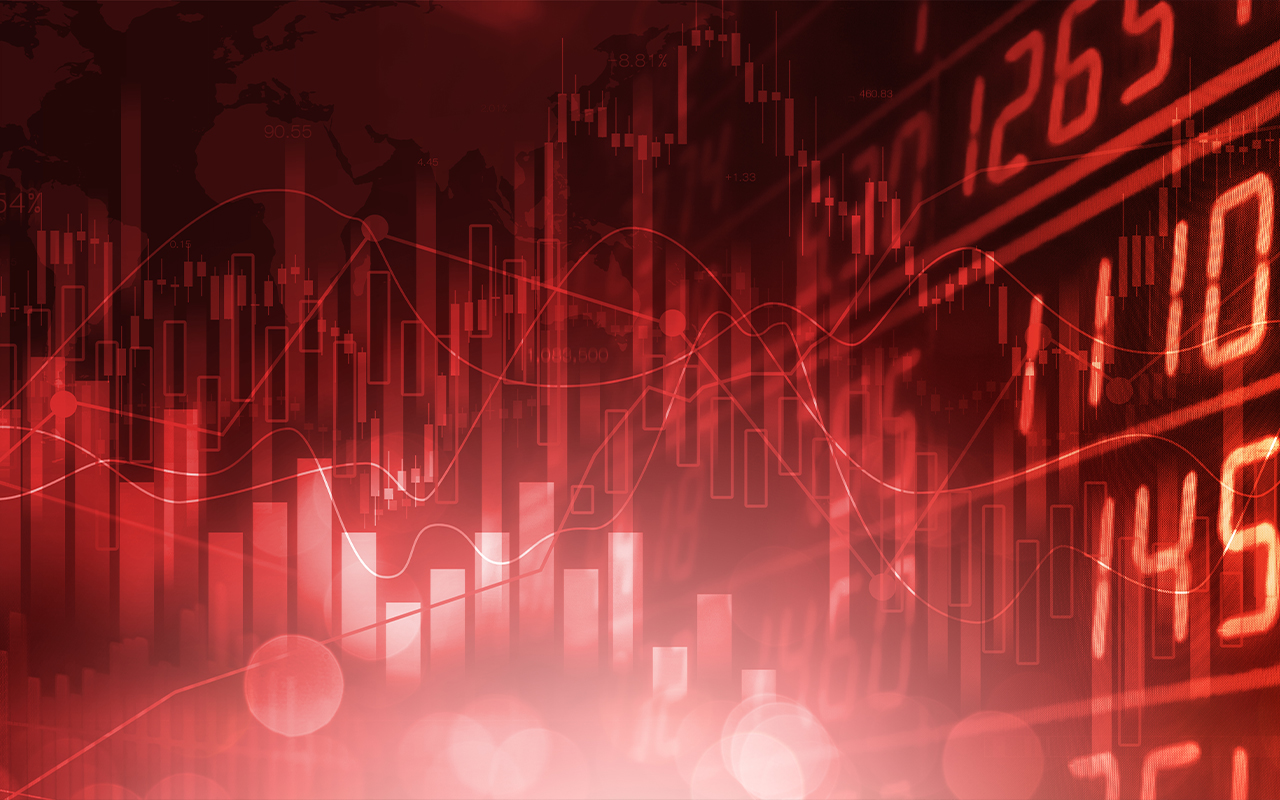 A misty red silhouette of charts and numbers on a board.